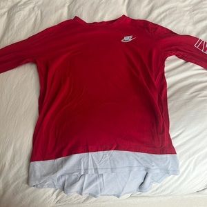 Nike, long sleeve shirt in good conditon. 2 small holes
